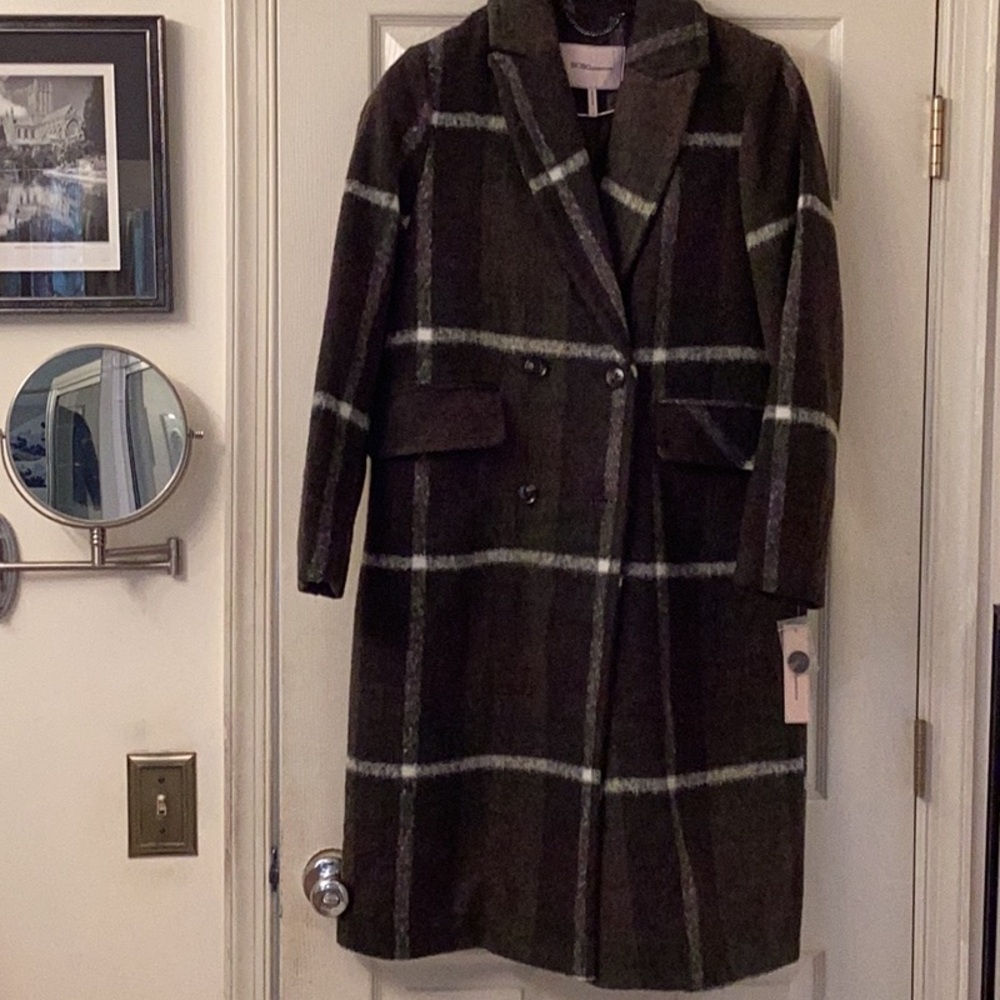 Double breasted wool blend coat.
